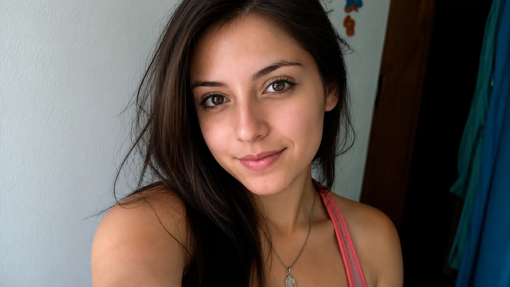 Before-and-after comparison of a pixelated portrait enlarged into a cleaner image. overlay