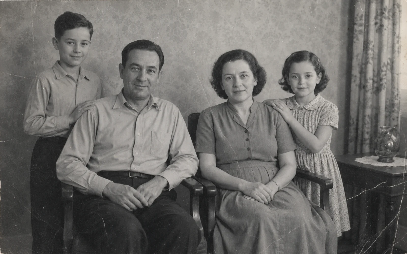 Before-and-after old photo restoration comparison showing scratches and fading reduced on a black-and-white family portrait.