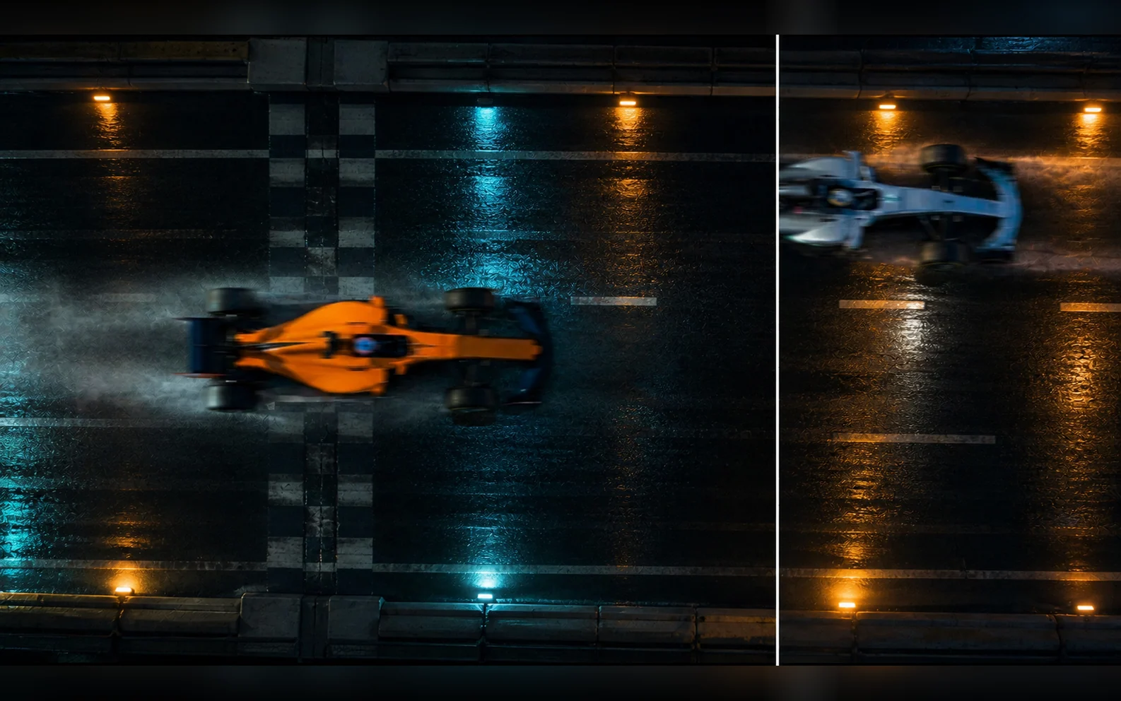 Top-down split-panel view of two open-wheel race cars crossing a rain-soaked city circuit at night with cyan and amber reflections and tire spray.