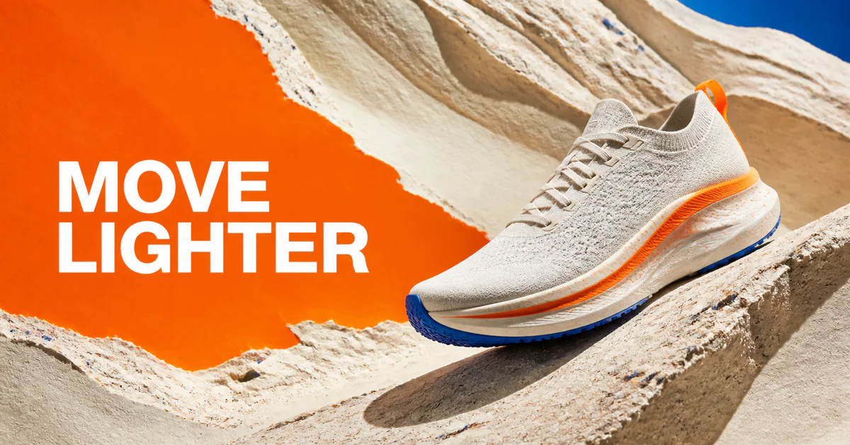 Landscape paid-social banner with a running shoe on sculptural paper terrain and the headline Move Lighter.